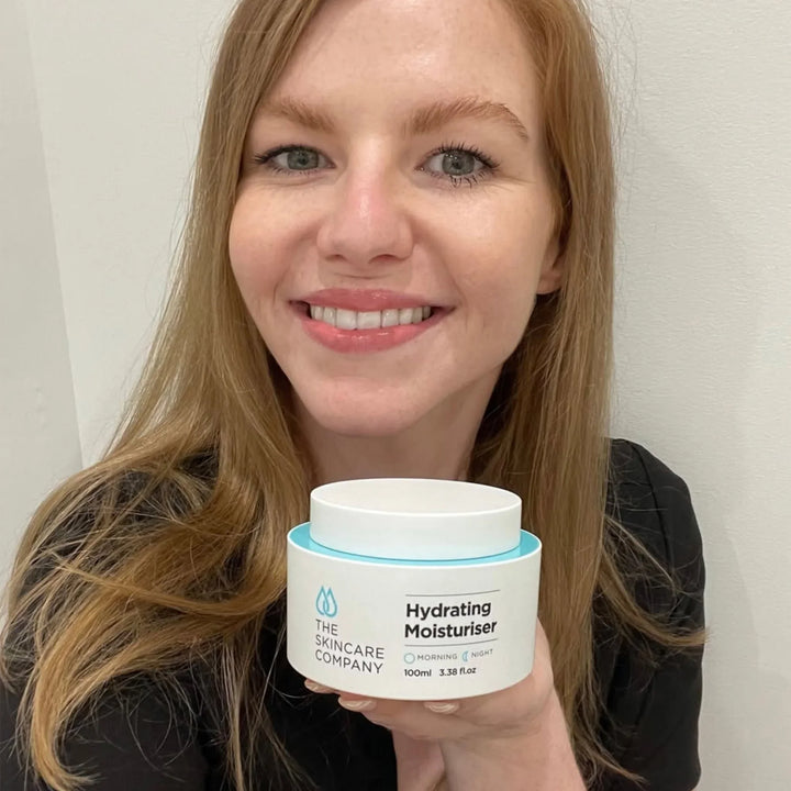 Woman holding a skincare jar